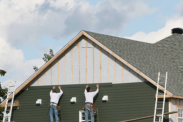 Professional Siding Installation technician working in Graham, TX